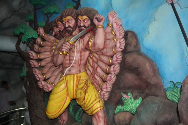 Ravana cutting his heads as sacrifice