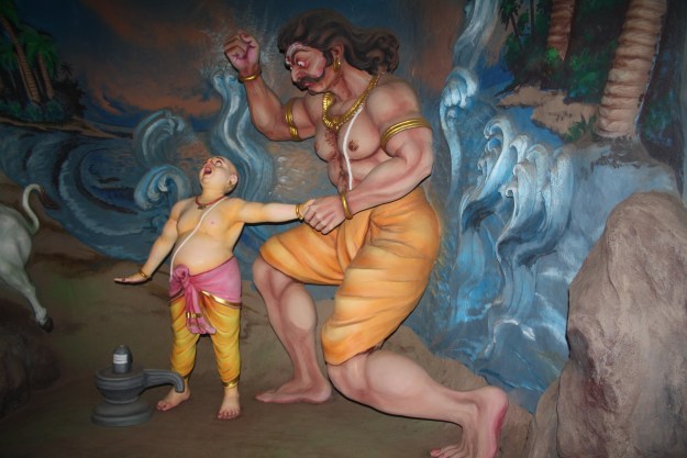 Enraged he hit the Bramhin boy (Ganesha) Enraged he hit the Bramhin boy (Ganesha)