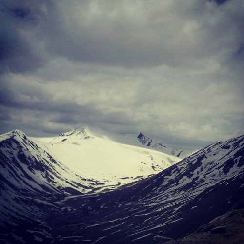Snow capped mountains atop Khardung La