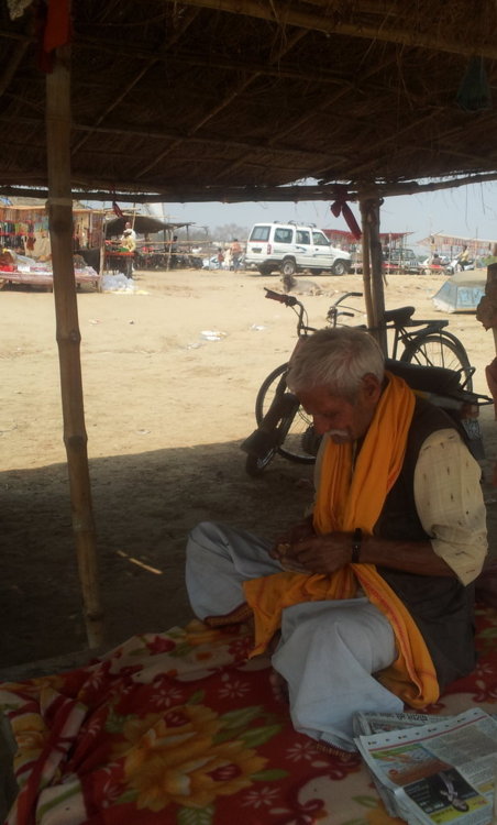 Panditji counting money